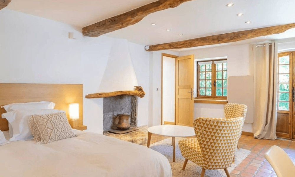 Interior salon with original stone walls and beams